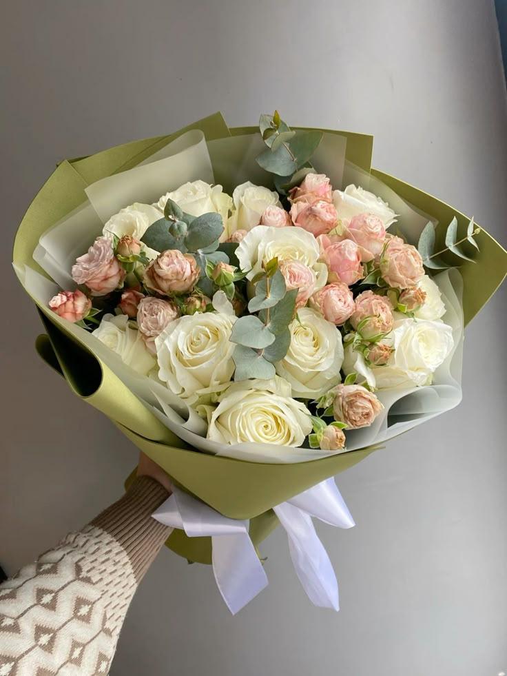 Professional floral arrangement in modern corporate setting